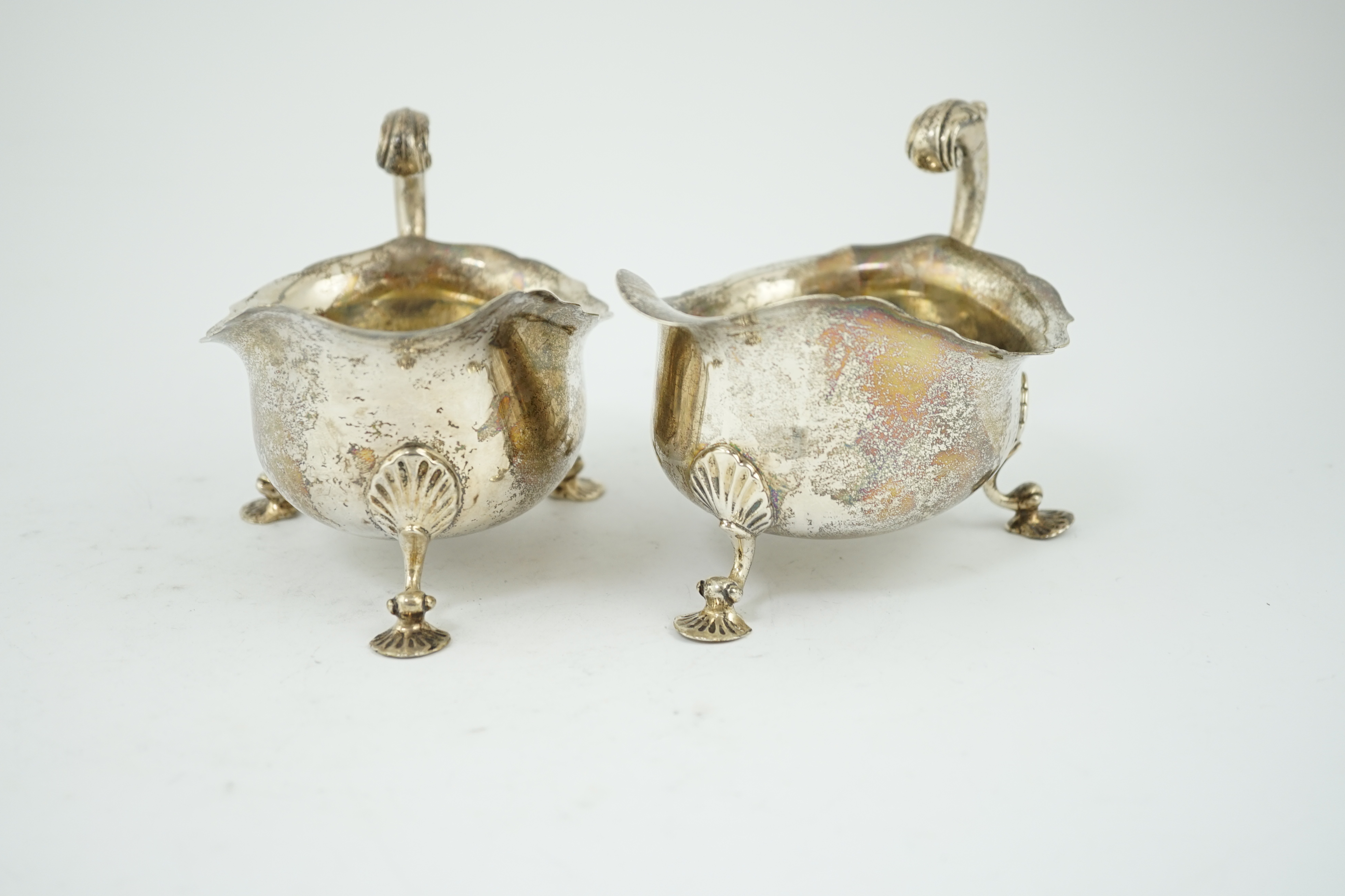 A pair of George V silver sauceboats, by Harrod's Ltd